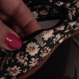 Tear on the right shoe